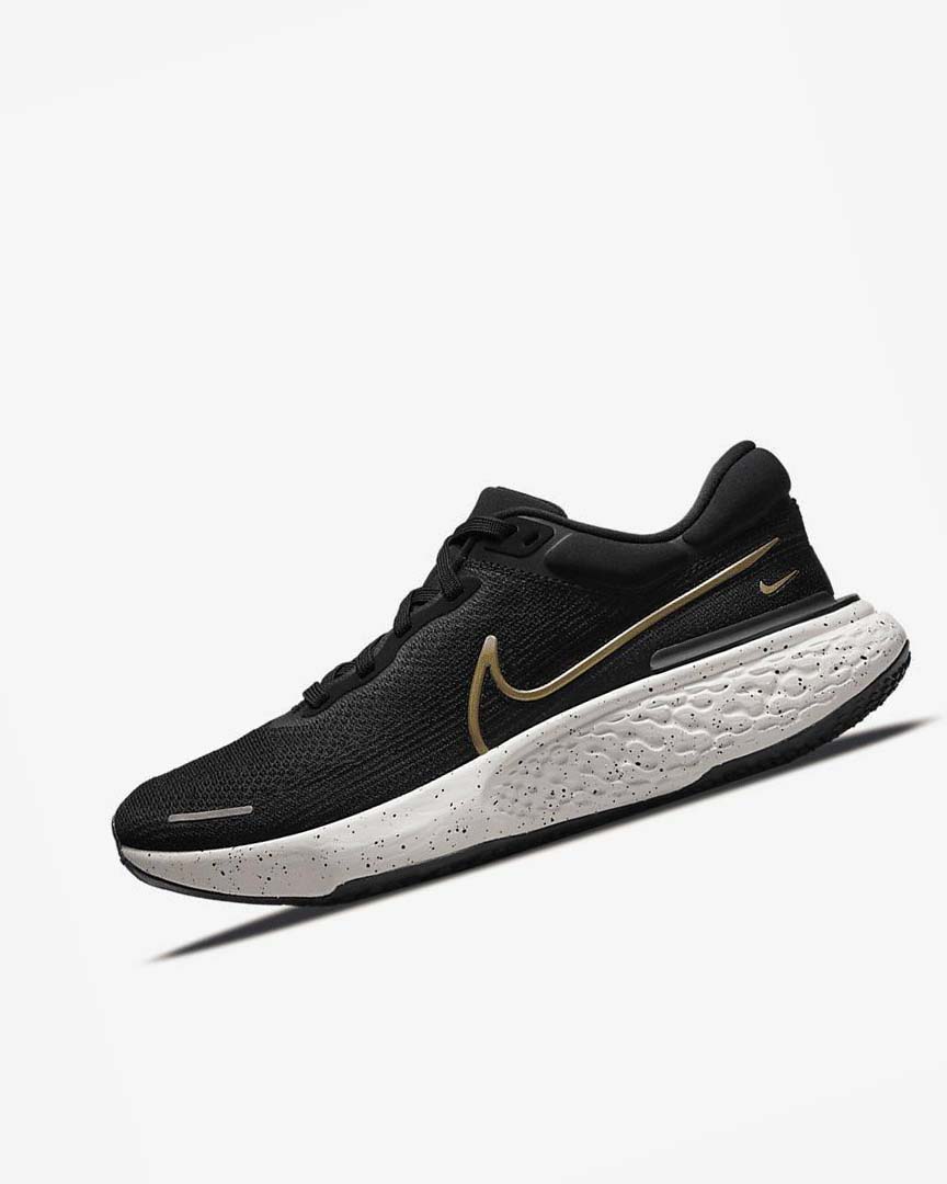 Black / Metal Gold Men\'s Nike ZoomX Invincible Run Flyknit Running Shoes | UK2385