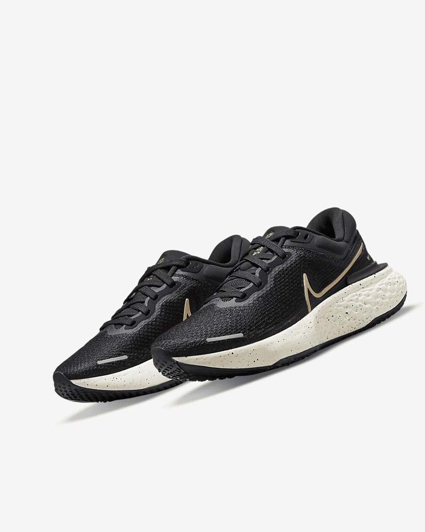 Black / Metal Gold Women's Nike ZoomX Invincible Run Flyknit Running Shoes | UK5438