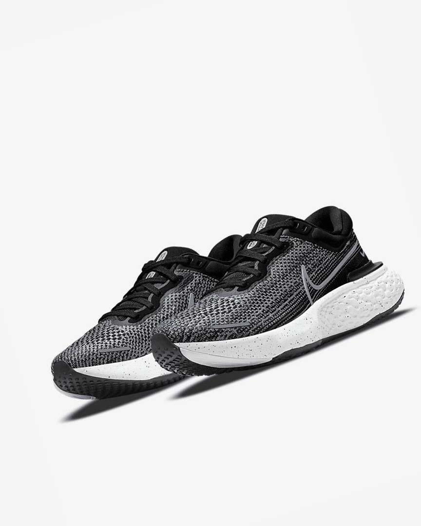 Black / White Men's Nike ZoomX Invincible Run Flyknit Running Shoes | UK2400